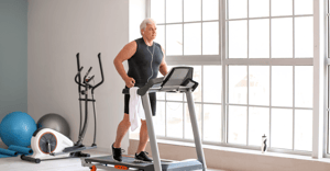 Senior man working out on treadmill